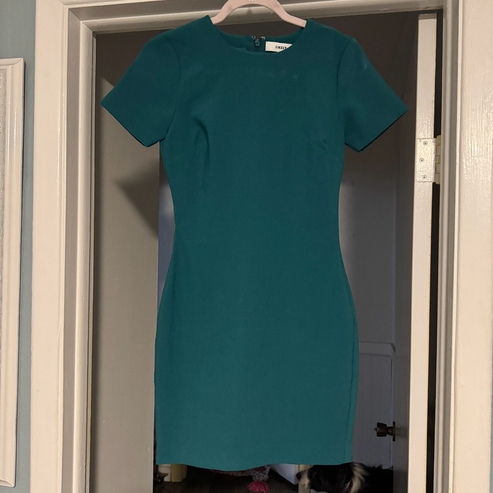 Likely teal dress